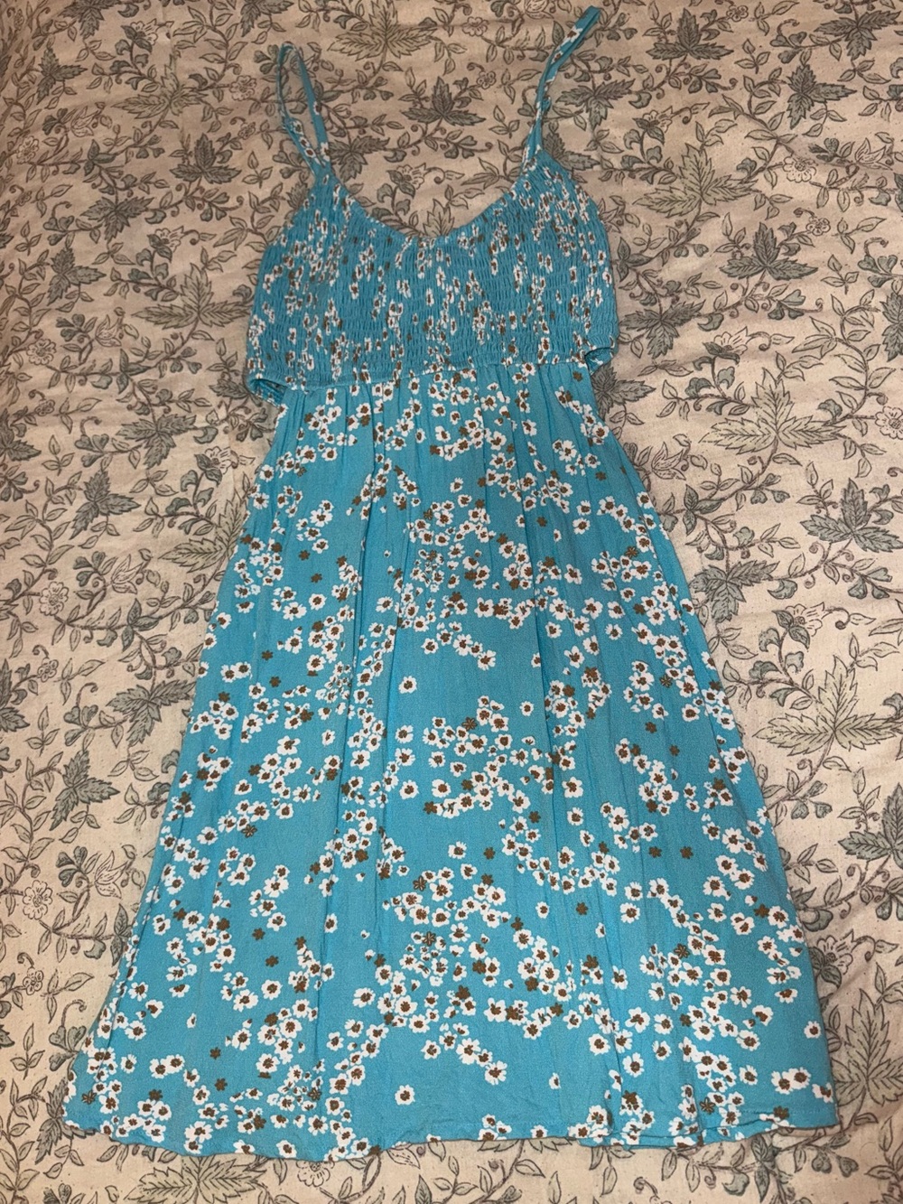 Roxy blue floral mini dress with small side cutouts